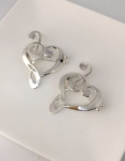Broches plata